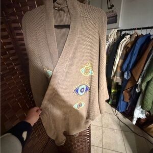 Embroidered Beige Poncho with Eye Motif
